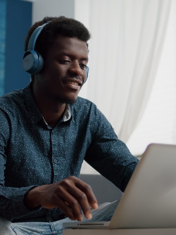 african-american-man-with-headphone-on-watching-movie-on-streaming-services.jpg african-american-man-with-headphone-on-watching-movie-on-streaming-services.jpg